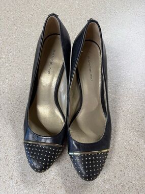Bandolino Black Pointed-Toe Pumps with Gold Accents.